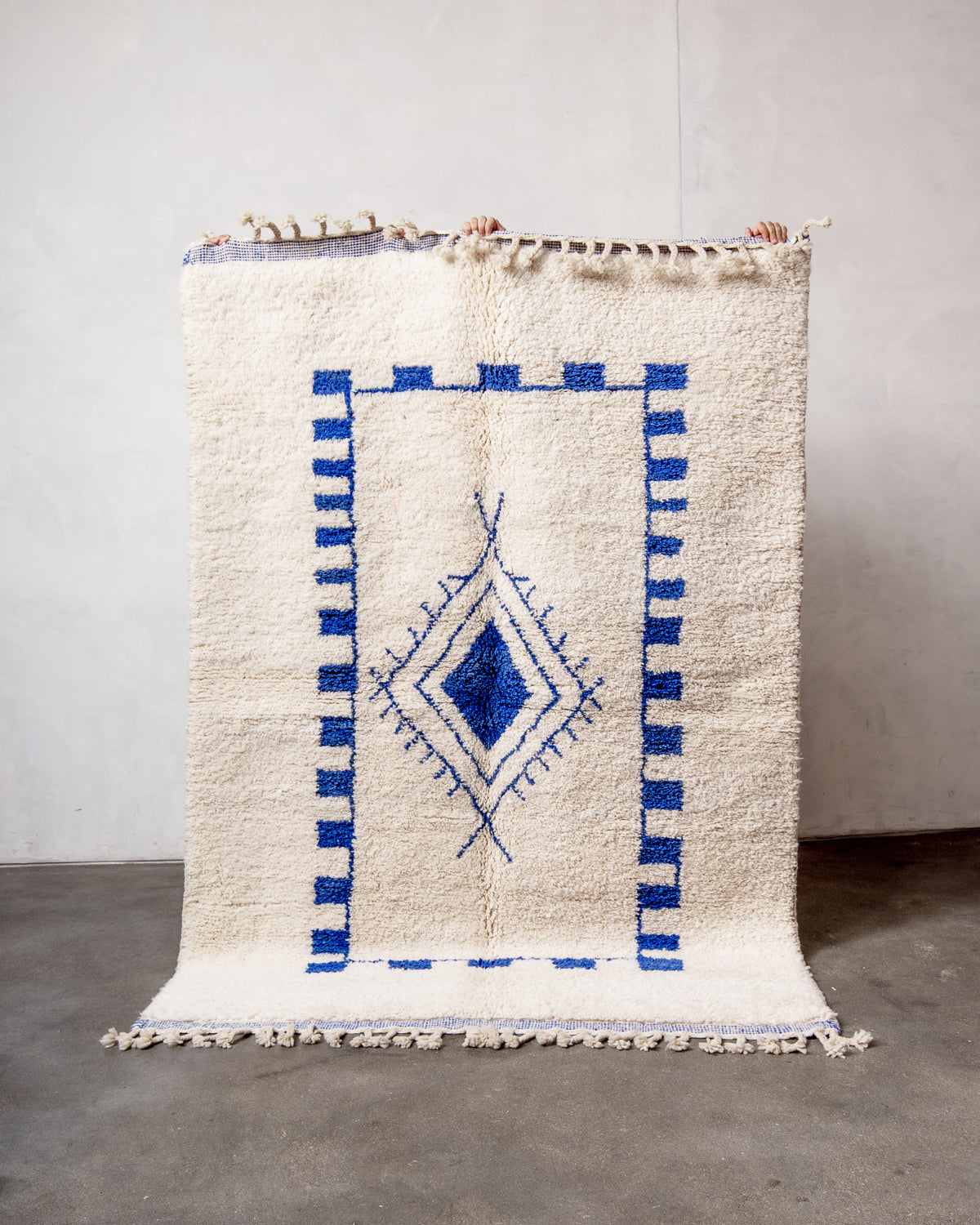 Modern, designer, handcrafted Berber rug from Morocco. Beniourain carpet with beautiful colours and patterns and fluffy wool texture.